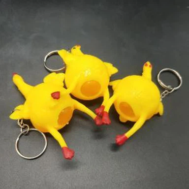 Pollo Toy Squeeze Laying Egg Keychain