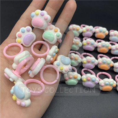 Giocattoli di plastica degli accessori dell'anello di cristallo dell'artiglio del cane del gatto sveglio di plastica